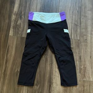 Lululemon crop in black with blue and purple trim